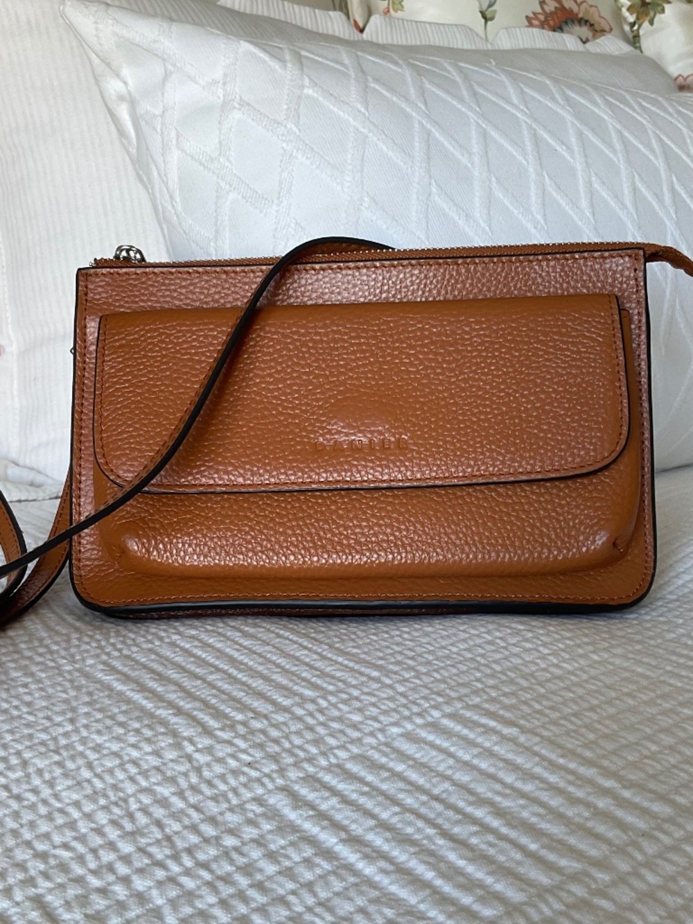 Danier Leather “Emmelie” Crossbody Phone Wallet in Camel